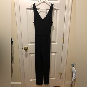 JJill Black one pc jump suit with belt. Elastic waist and back. So comfortable.